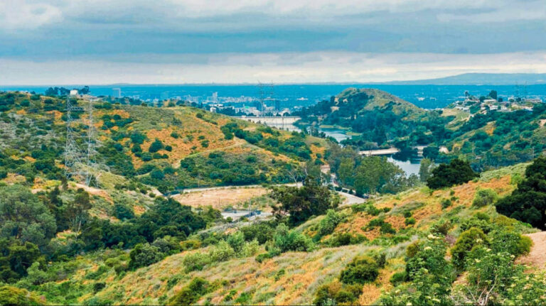 Overlooking view of the stormy Los Angeles and the Hollywood Reservoir from the Hollywood Hills