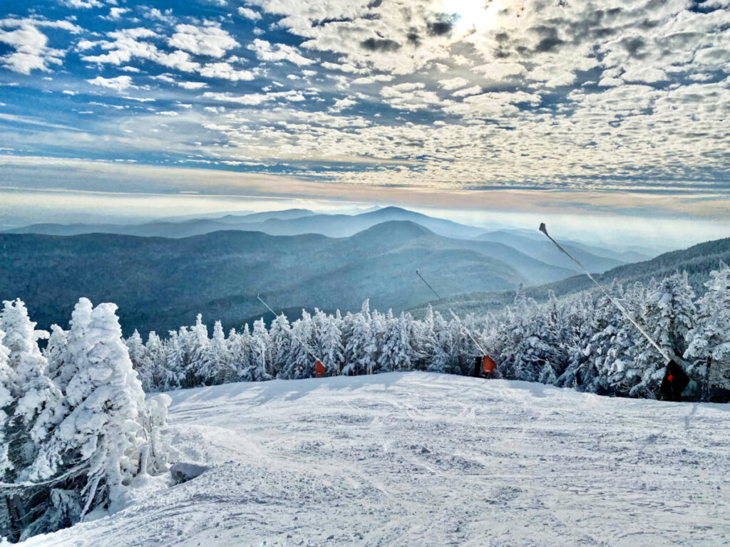 Picturesque view of the mountain and sky from the snow covered Stowe Mountain Ski Resort