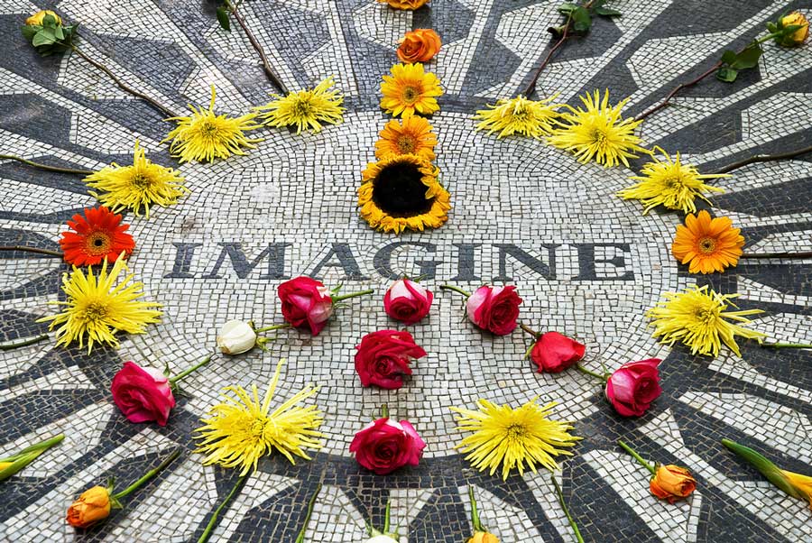 The Imagine Mosaic with flowers on it at Strawberry Fields
