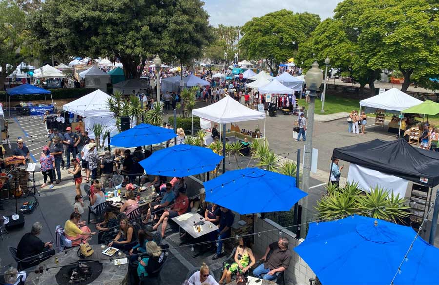 View of people at the Street Fair in the Village