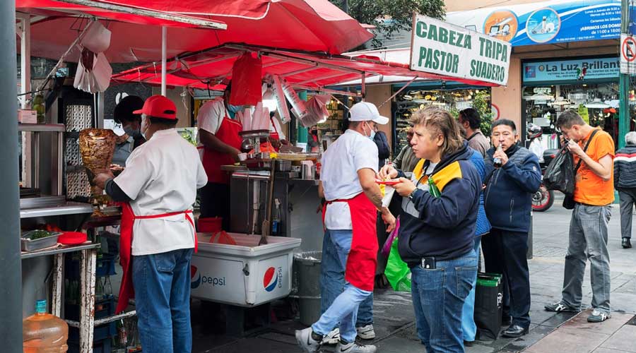 People eating street foods in Mexico City