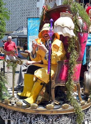 View of a man on the street performance at Cherry Creek Art Festival