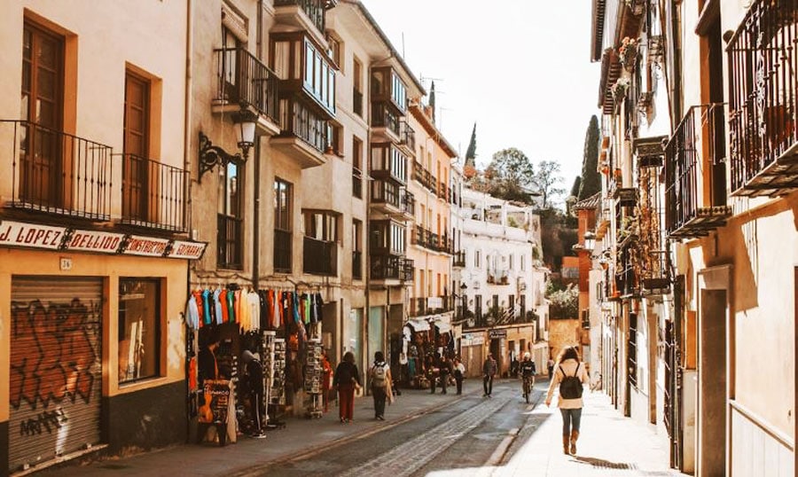 View of an alley and people walking in Granda Spain