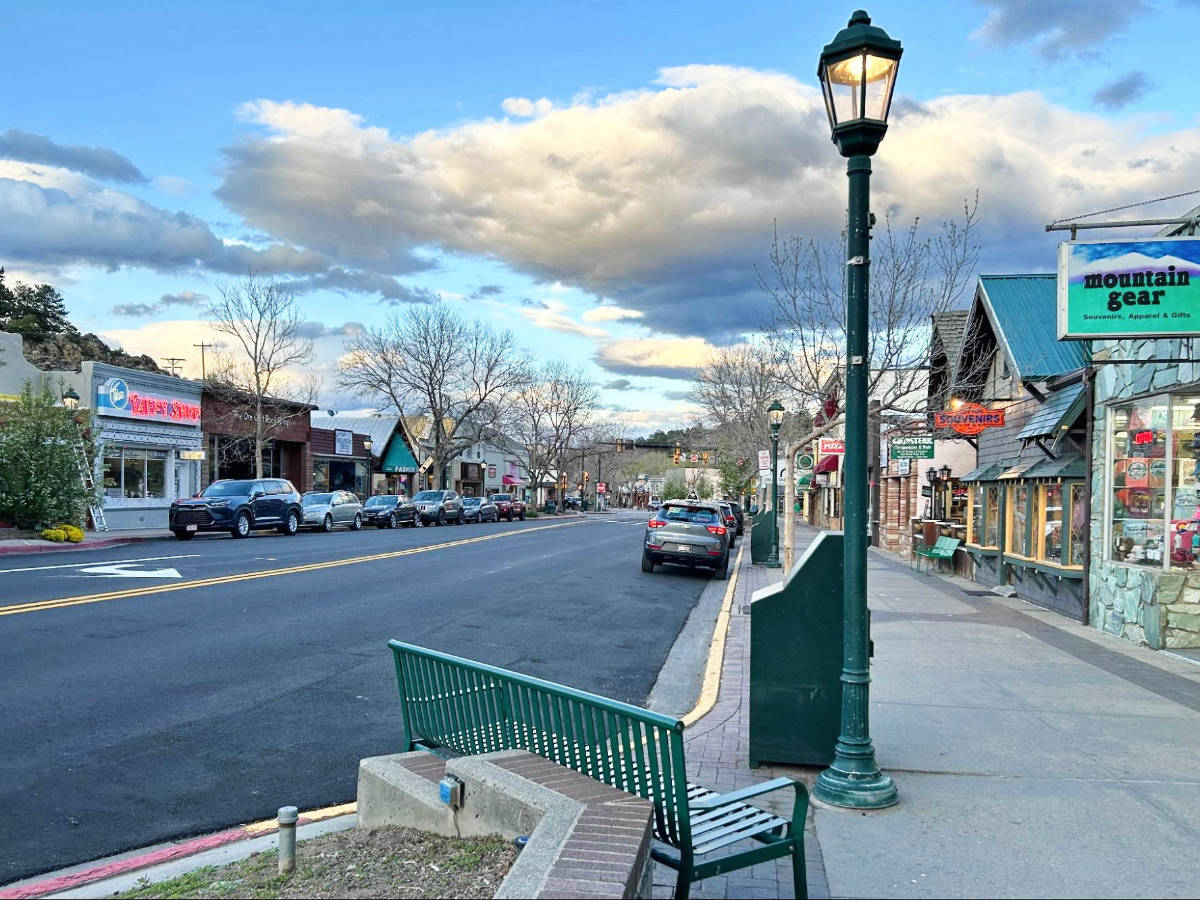 Cars parked on both sides of the street in Downtown Estes Park