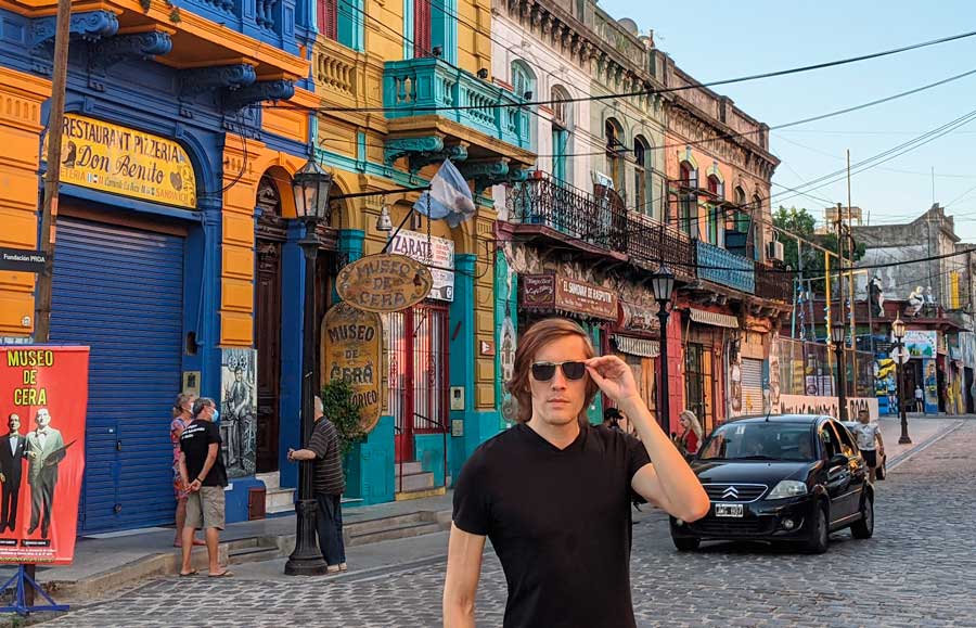 Nate posing for a photo on a street in Buenos Aires