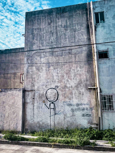 A graffiti on the wall at a a random street in Cancun