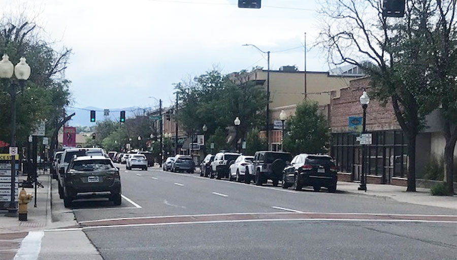 Cars parked alongside the road in Littleton