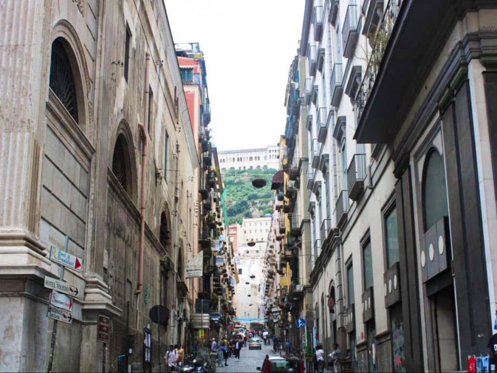 View of a buildings around a busy street in Naples