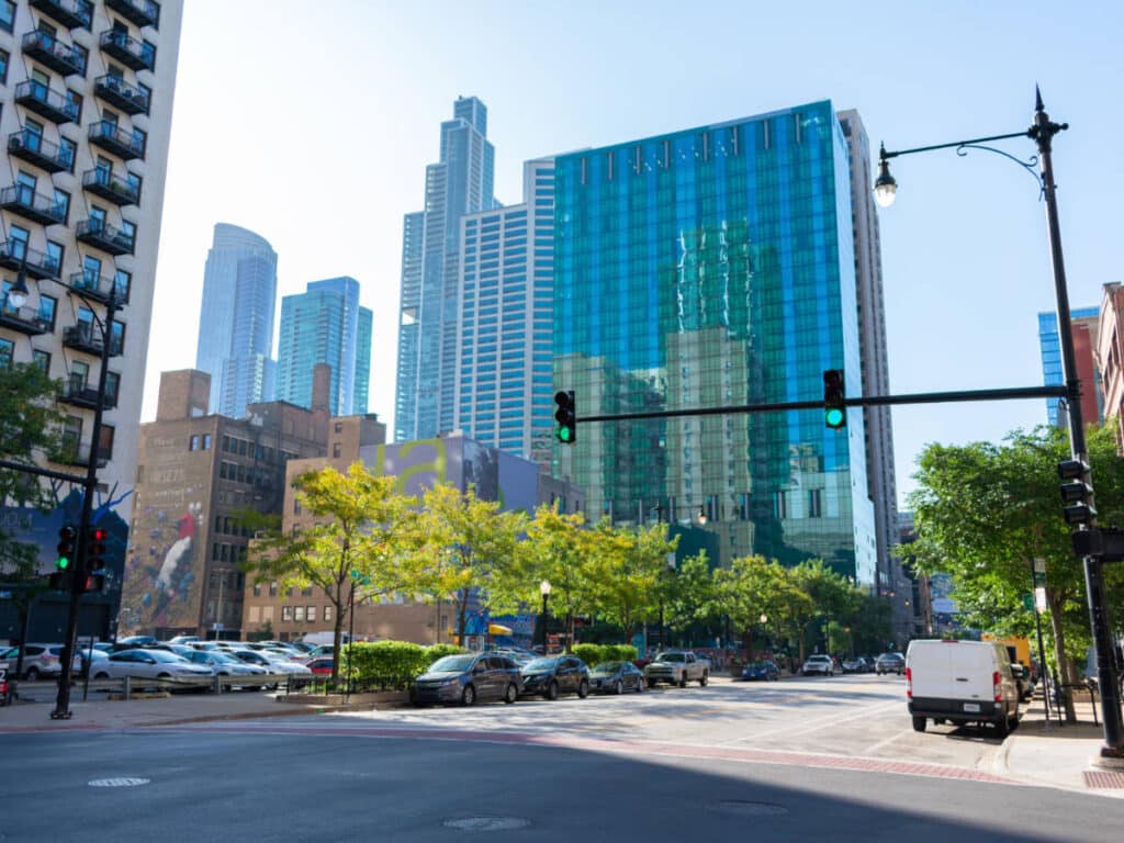 View of cars and stoplights on a street in South Loop