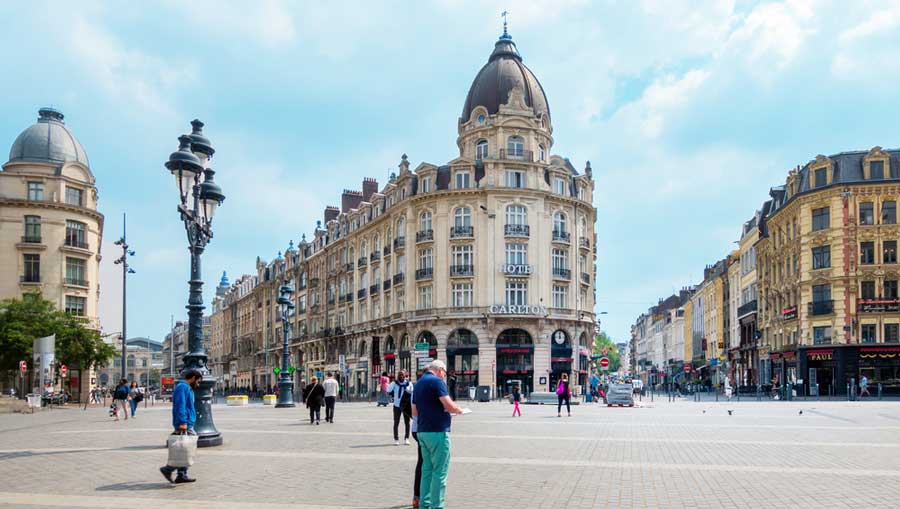 People and beautiful architecture in the streets of Lille