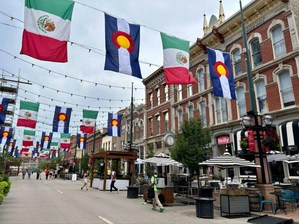 View of the flags hung in the middle of Larimer Square