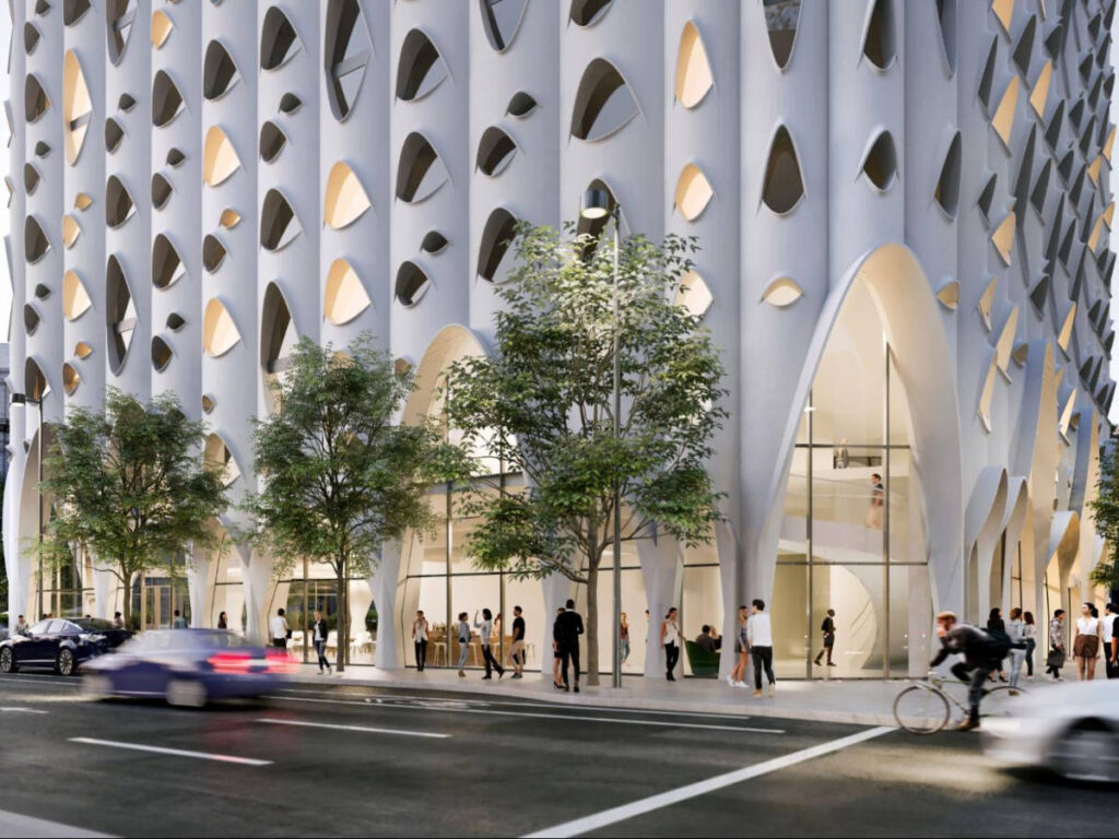 People passing by the building of Populus hotel in Denver, Colorado