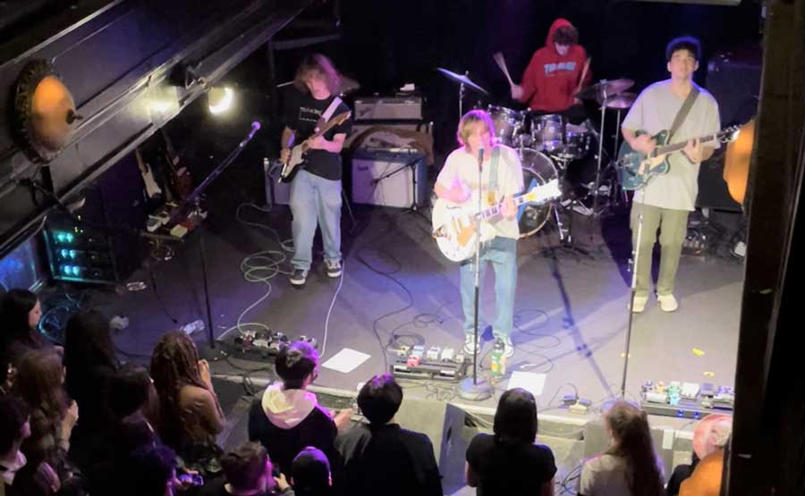 People watching the Ax and the Hatchetmen performing in Subterranean