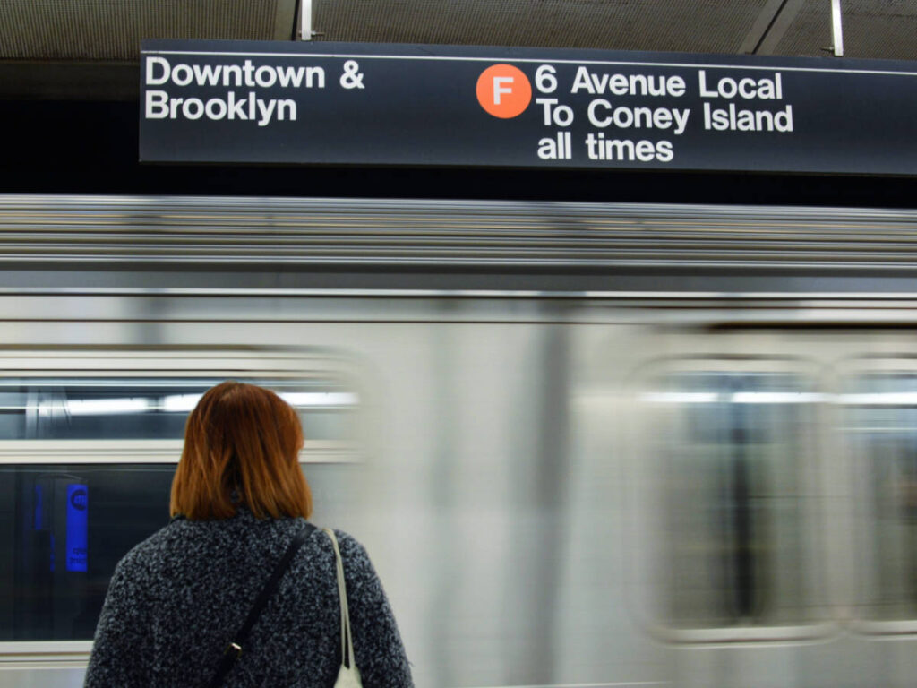 Woman waiting on the subway in New York City