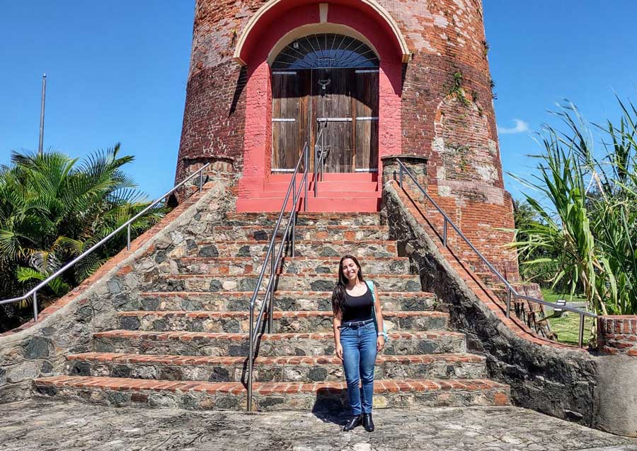The author in front of an old sugar mill in Ron del Barrilito