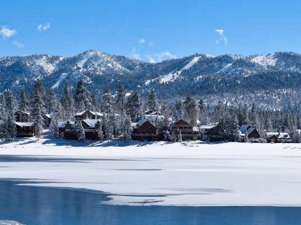 View of the snow covered hills and cabins in Big Bear