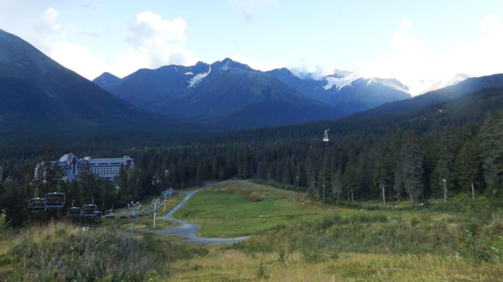 Overlooking view of the mountain valleys and ski lift of Alyeska in summer