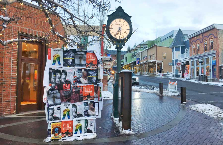 A bulletin board and a town clock in Park City, Utah