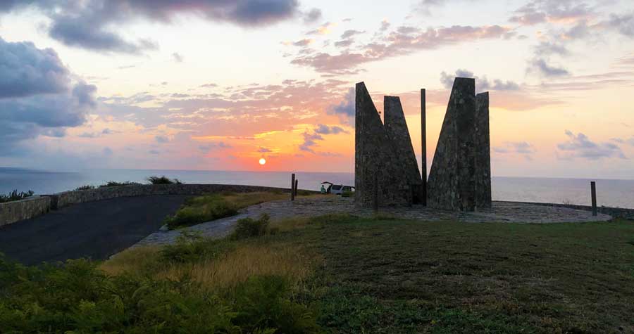 View of the sundial at Point Udali and the colorful sky at sunset
