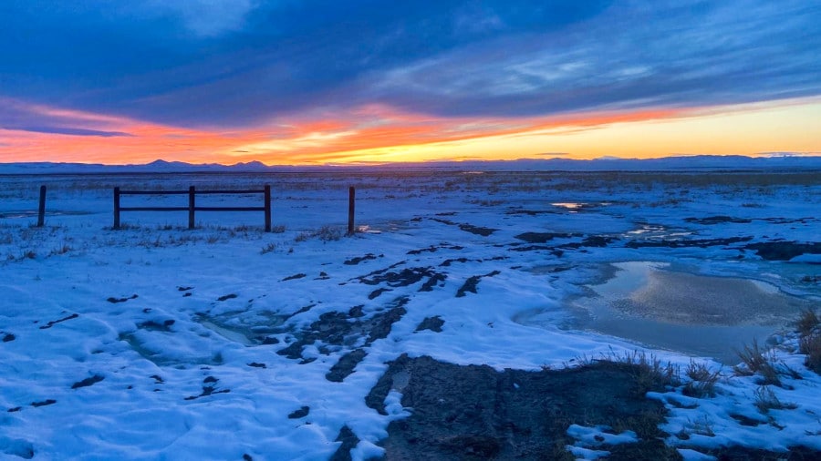 View of the sunrise from the trail to Meadow Hot Springs in winter