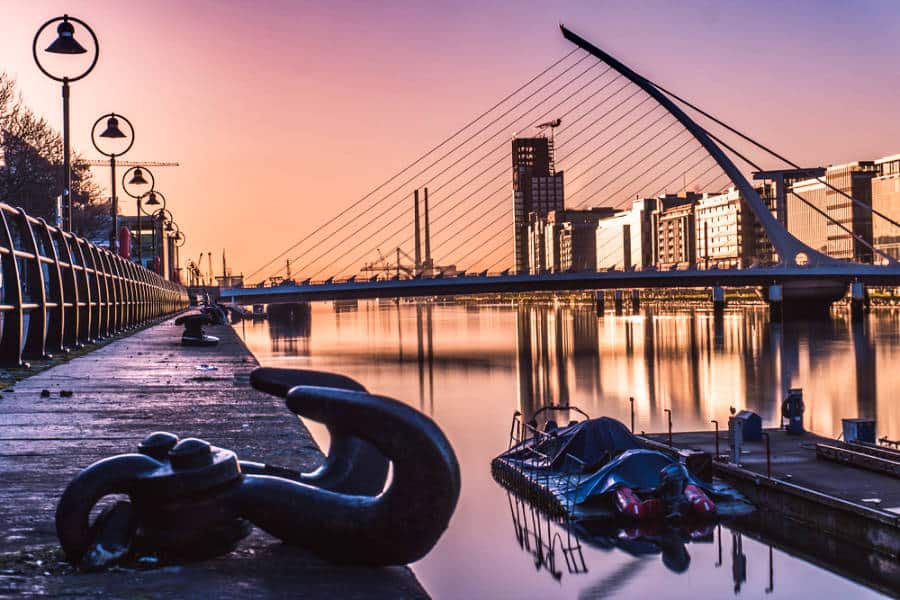 View of the Samuel Backett Bridge over the river at sunrise