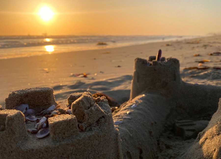Close up view of a sandcastle during sunset in Sunset Beach