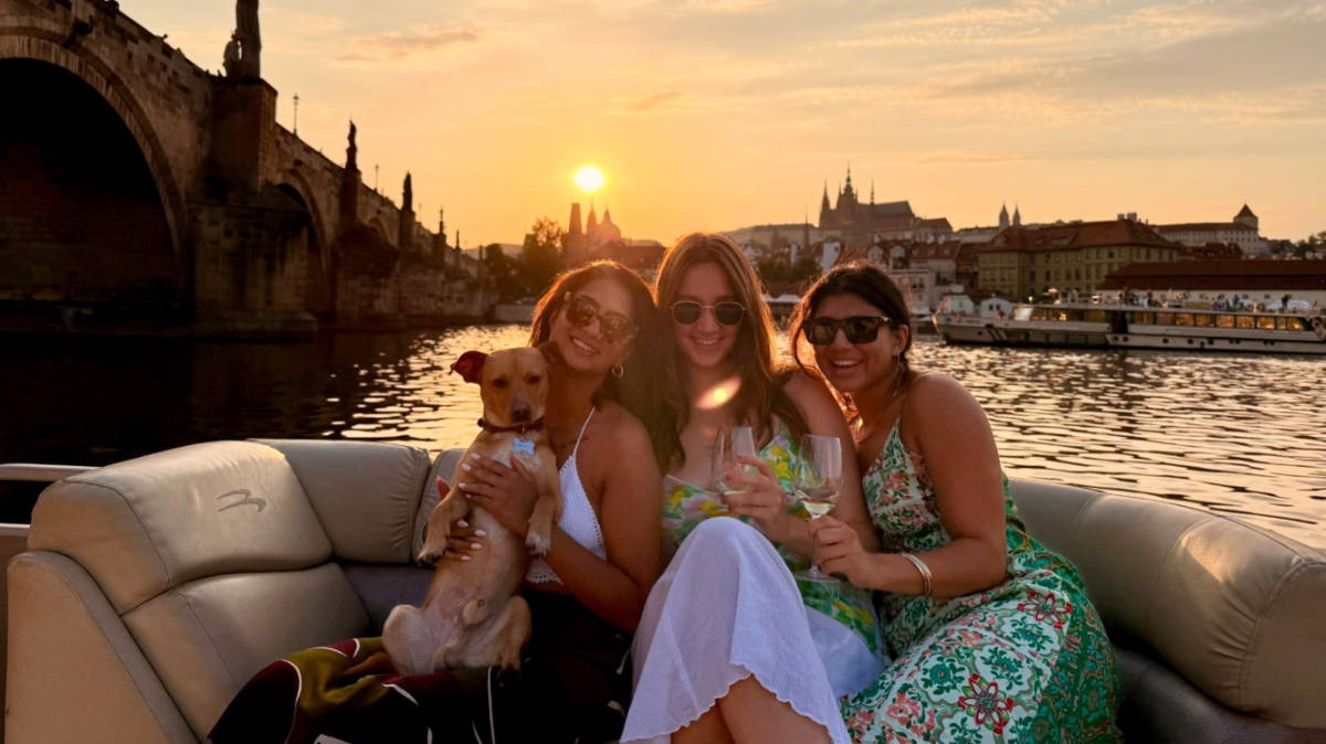 The author Meera Devotta and her friends at a sunset cruise on The Wine Boat