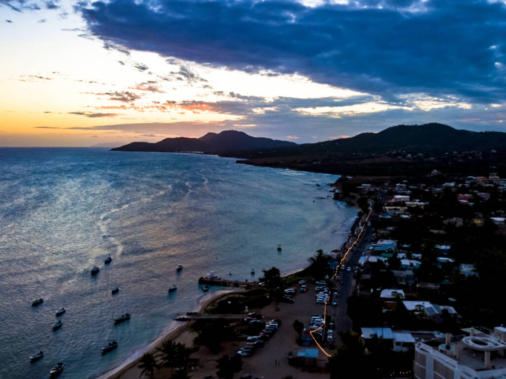 Aerial view of the sunset over the small town of Esmeralda in Vieques