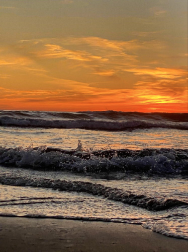 Scenic view of the sunset over the beach