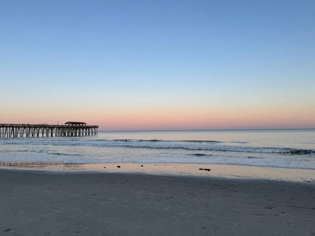 Scenic view of the sunset at Surfside Beach from the shoreline