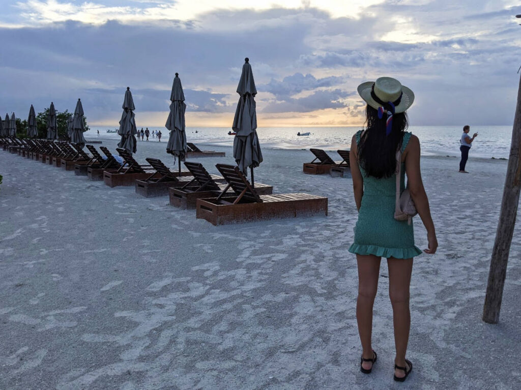 Travel Lemming writer Clara Kesseler admiring the sunset at Isla Holbox