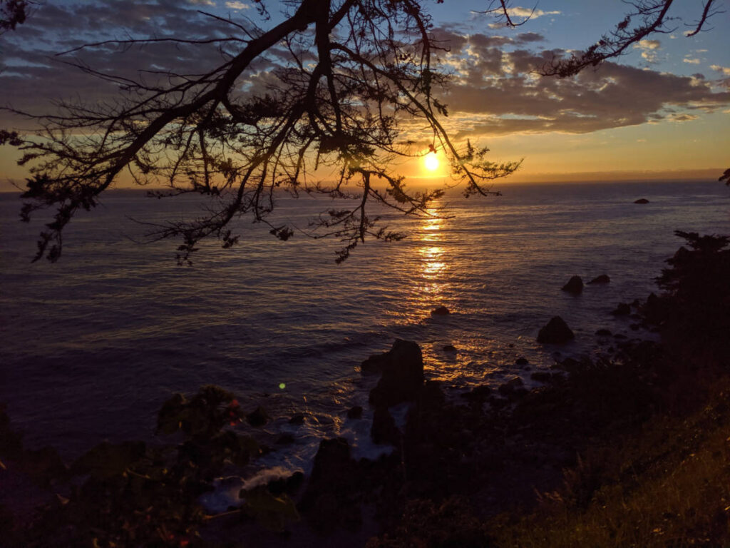 Sunset views over the Pacific Ocean from the hot springs at the Esalen Institute