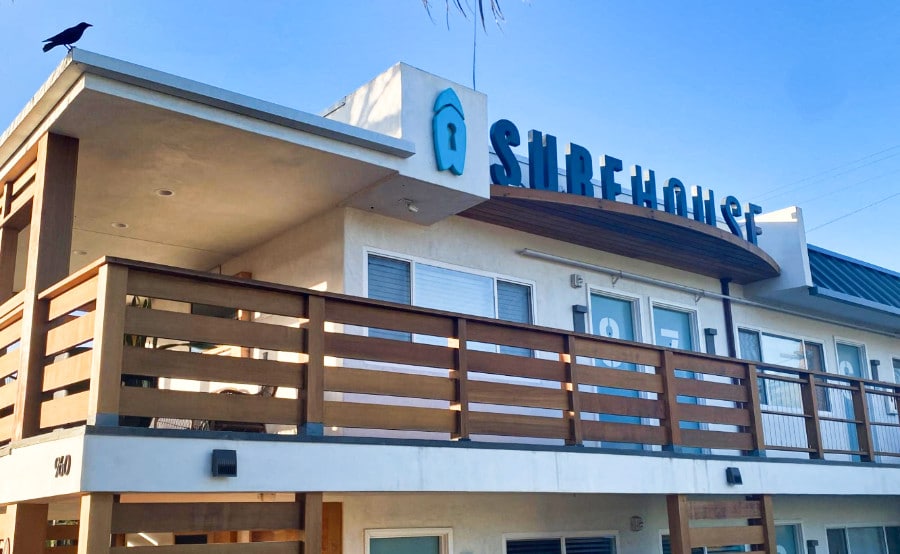 Exterior view of the coastal rustic vibe Surfhouse motel in Encinitas