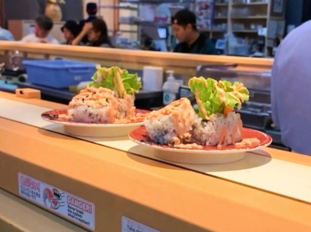 A sushi conveyor belt on a restaurant