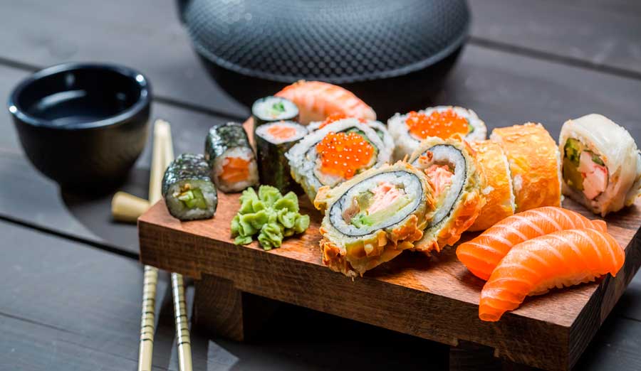 View of sushi on a wooden tray