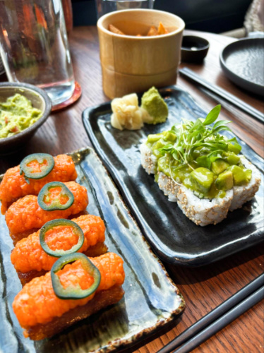 Two servings of different sushi at Los Mochis City