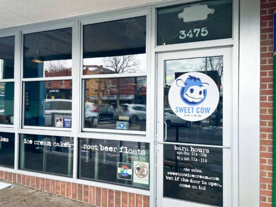 View of the entrance of Sweet Cow Ice Cream from the outside