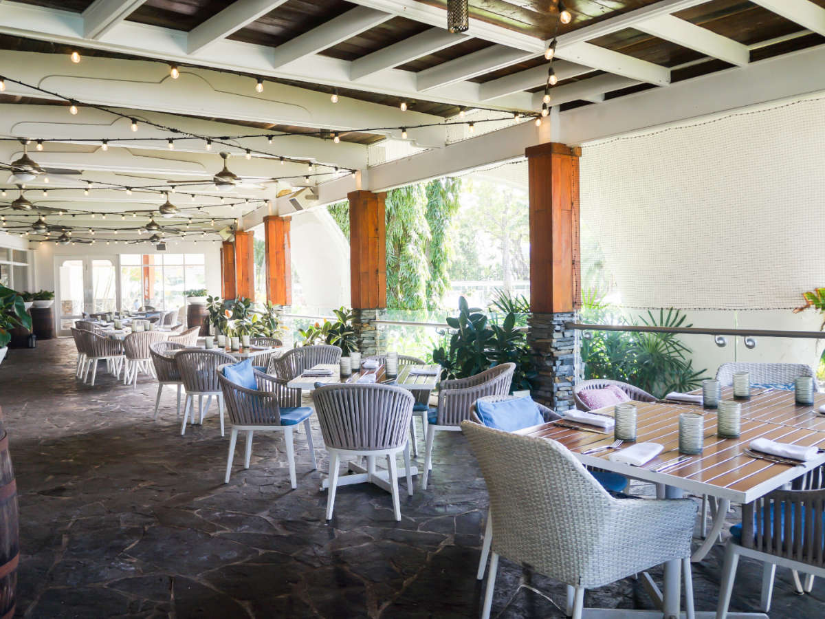View of chairs and tables on a restaurant in Fairmont El San Juan Hotel