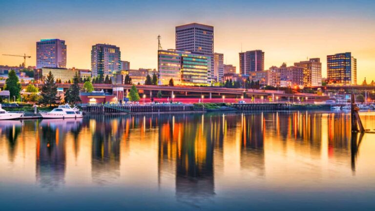 View of the Tacoma skyline reflected on the water at sunset