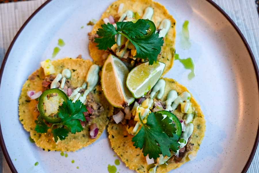 Tacos with sliced lemon on a plate, served in Casa Grande Mountain Retreat