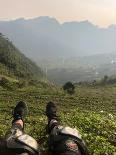 Taking a break in Ha Giang with a view of the mountains