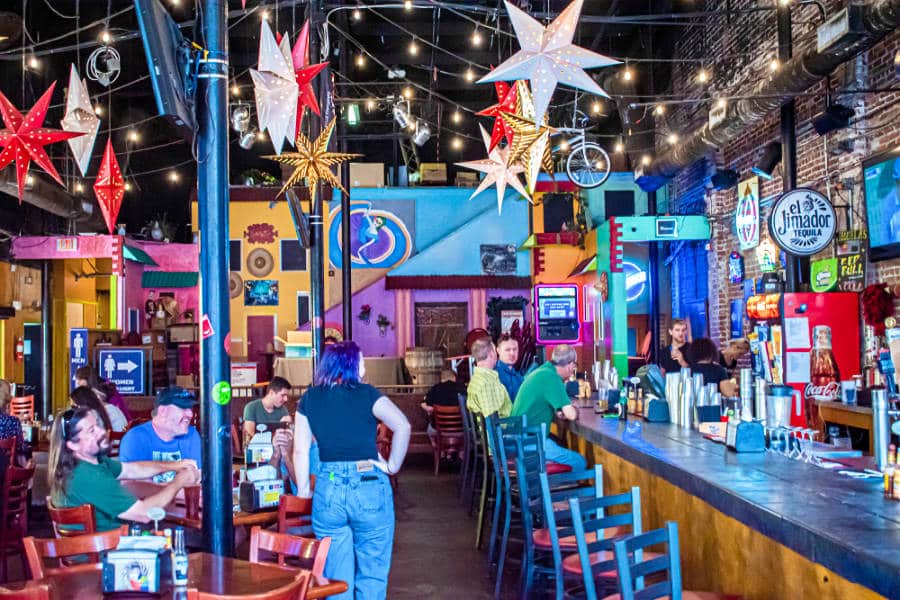 Interior view of a vibrant and colorful bar in Tampa