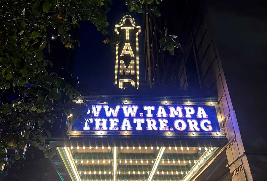 The iconic Tampa Theater sign illuminated at night