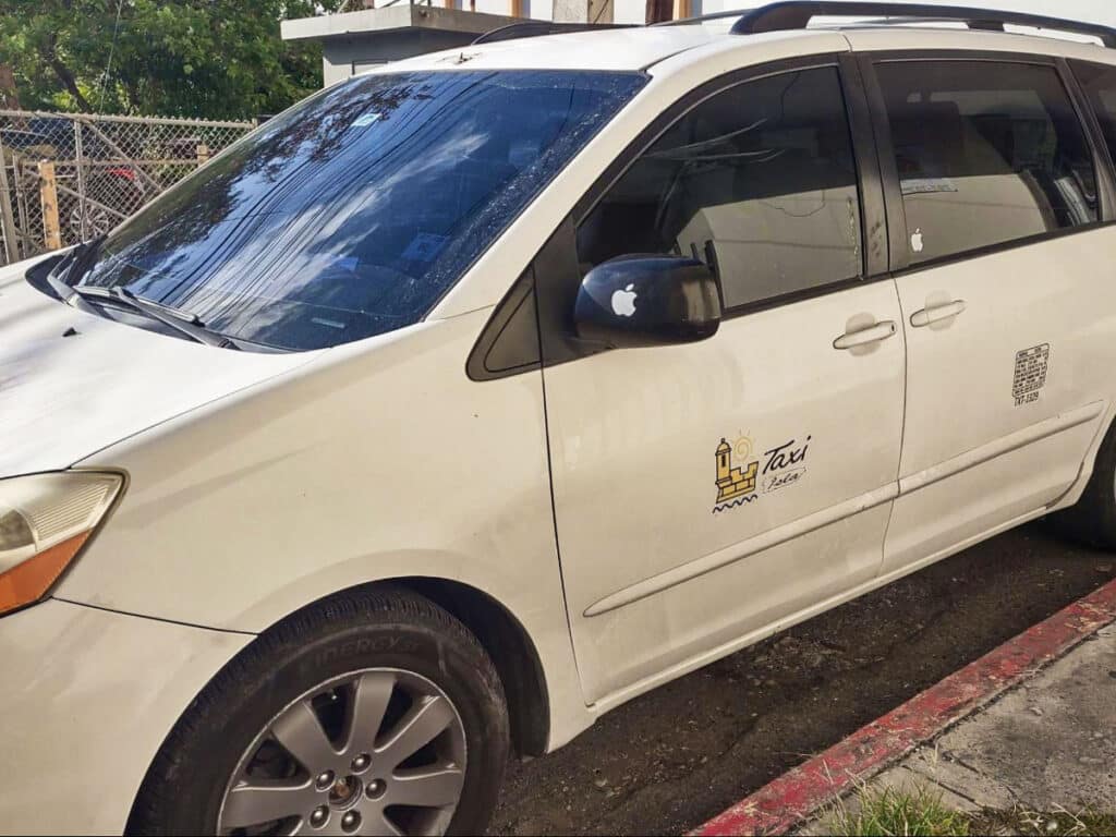 Closeup view of a white taxi in Puerto Rico