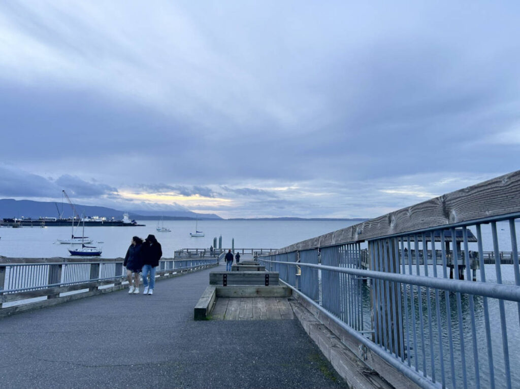 A couple walking at the Taylor Dock in Fairhaven