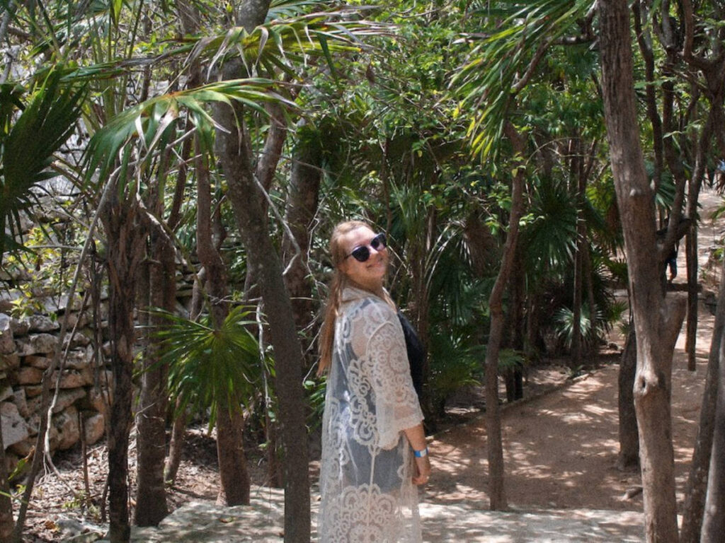 The author, Taylor Herperger wearing a white beach coverup