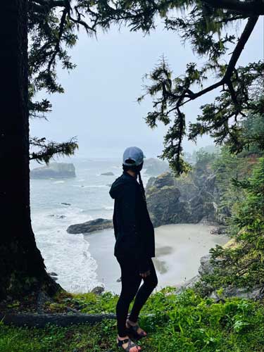 Taylor Ramsey admiring the view on a secret beach near Brookings
