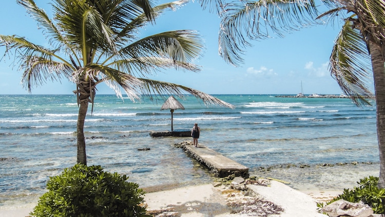 The author Taylor at the boardwalk in Puerto Aventuras