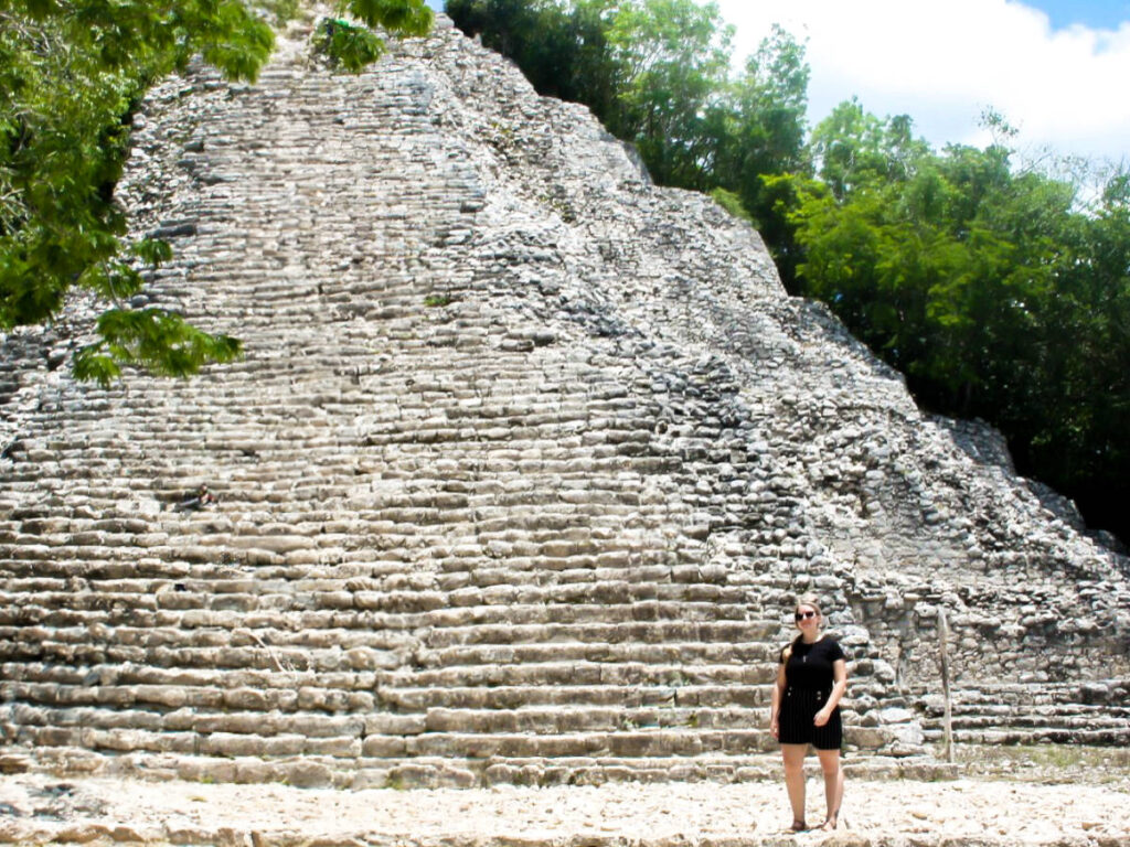 The author Taylor, standing at the bottom of the Coba Ruins