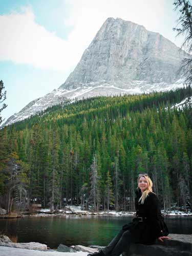 Taylor Herperger smiling for a photo in Canmore, Canada